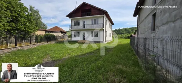 Casă 8 camere Voinești - poza 1