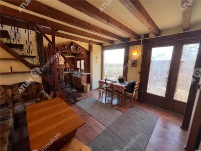 De vanzare cabana amplasata pe teren de 640 mp cu PUZ aprobat situata in Tropinii Noi din Sibiu - Rasinari