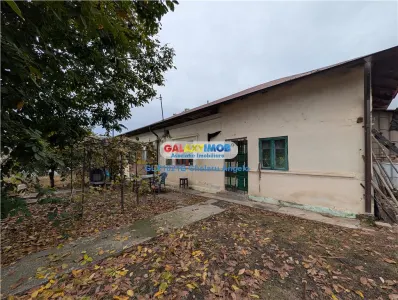 Orasti casa batraneasca, teren 1400 mp deschidere 28 ml,toate utilitat - Frumusani